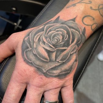 The True Meaning of Black Rose Tattoo That Many Dont Know