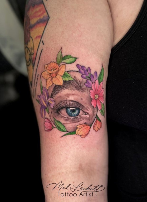Mel realism flower eye tattoo