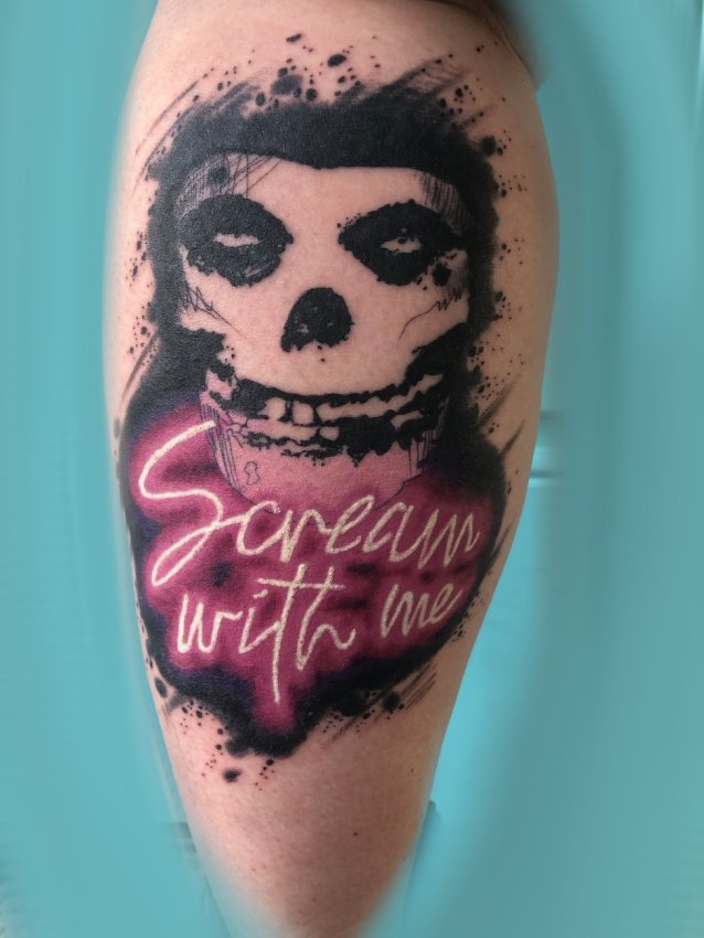 Colin skull tattoo